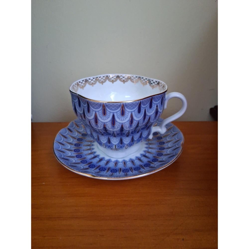 Nantucket blue/white/gold cup and saucer (China logo stamped)